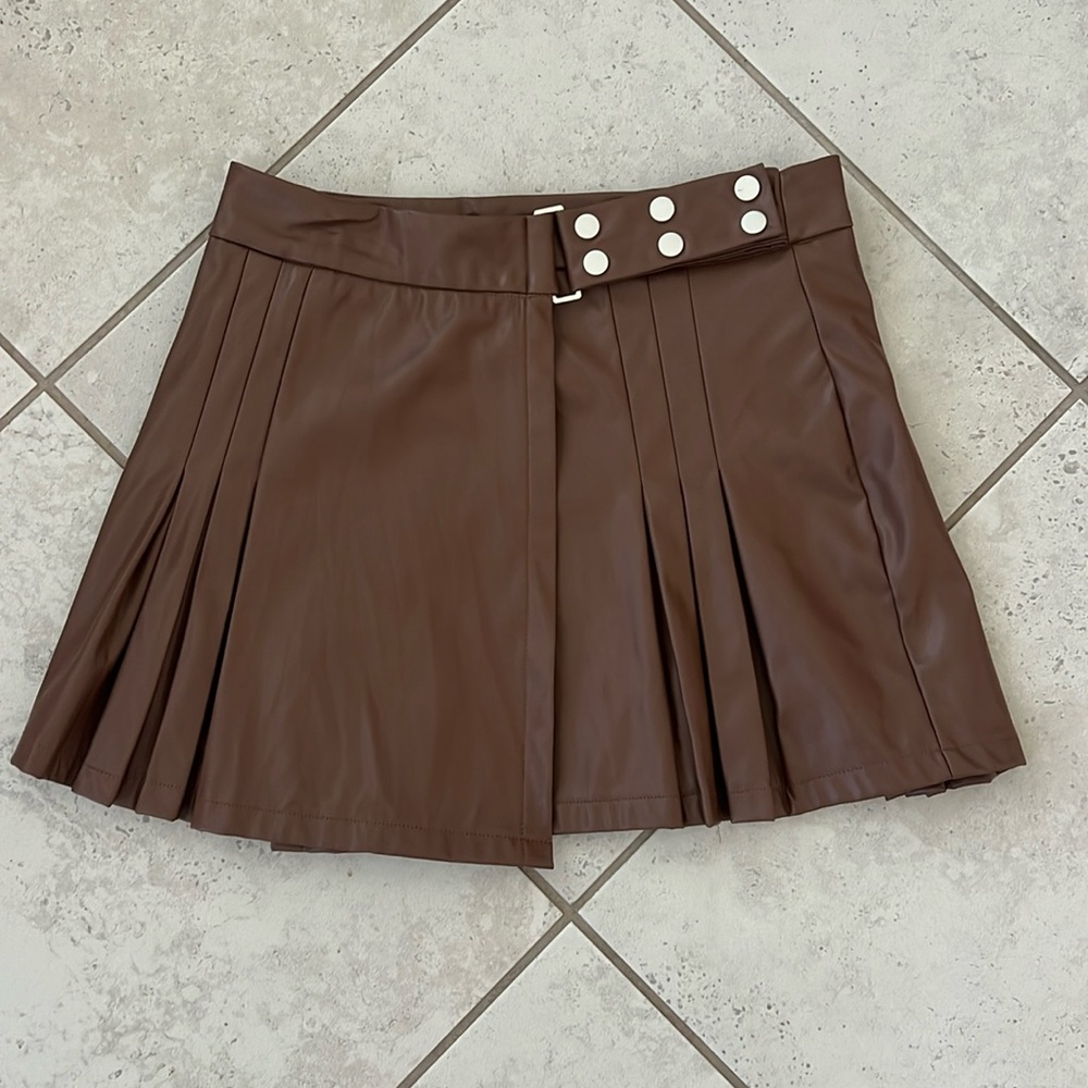 Brown leather skirt.